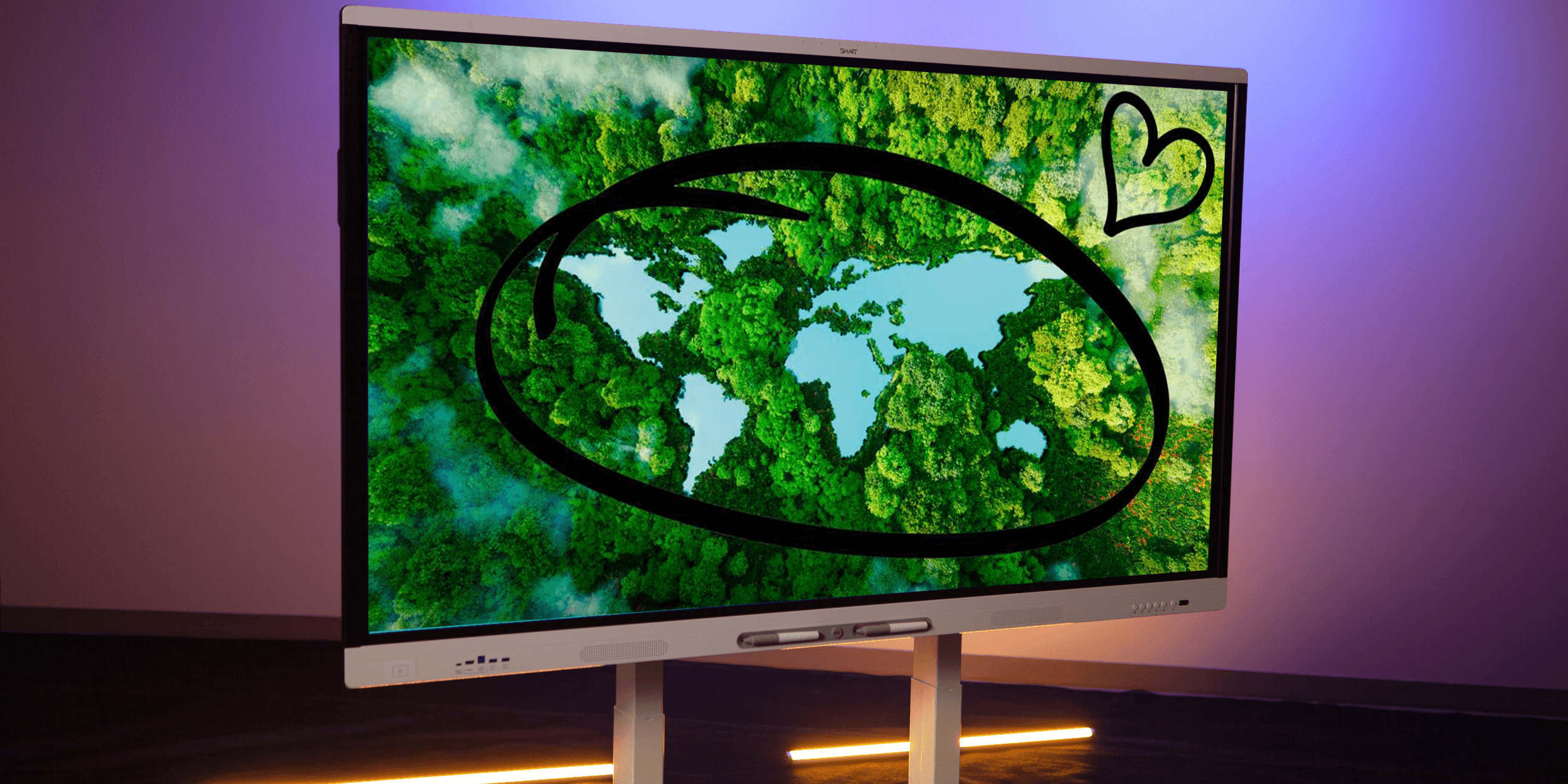 New SMART Board display featuring an image of a lush forest.