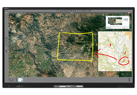 An interactive display screen showing a satellite image of a rugged terrain with marked areas for tactical planning, part of the SMART Meeting Pro suite which offers tools for digital brainstorming and collaboration.